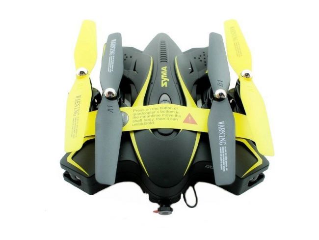 Р/У квадрокоптер Syma X56W-P Folding Wizard с FPV трансляцией Wi-Fi, оптич.стабил., барометр, 2.4G Р/У квадрокоптер Syma X56W-P Folding Wizard с FPV трансляцией Wi-Fi, оптич.стабил., барометр, 2.4G
